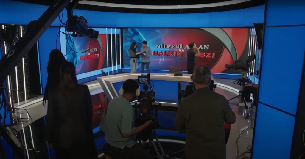 Camera crew capturing intense drama for the series